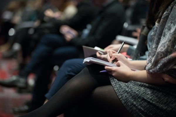 Scottish government in session taking notes